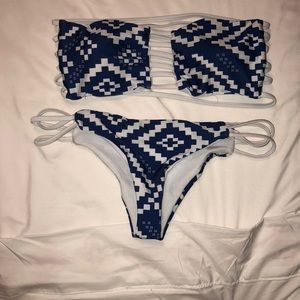 I am selling blue and white strapless bikini.